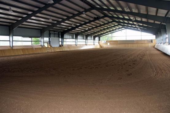 large open span covered horse arena