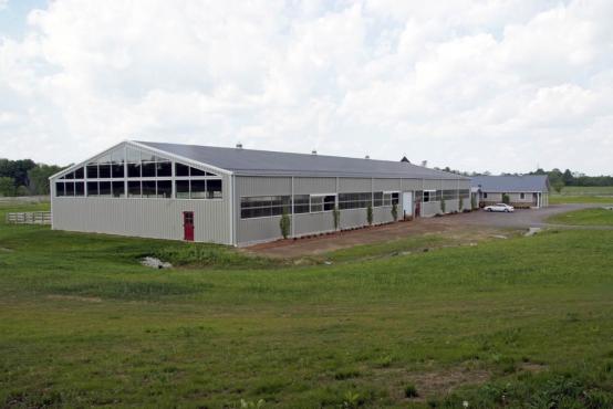 large open span covered horse arena