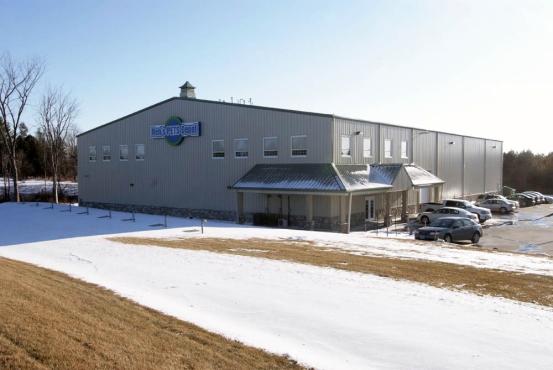 commercial steel building with warehouse racking and mezzanine