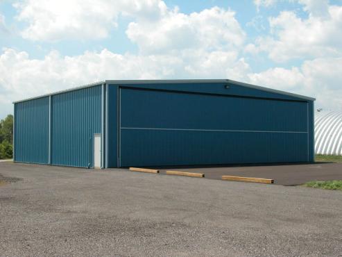 aircraft storage building with blue wall panels