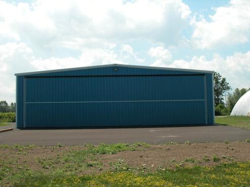 aircraft storage building with blue wall panels