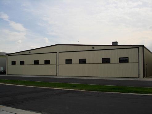airplane hangar building with windows