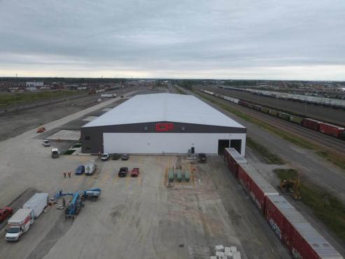 industrial steel building with railway loading access