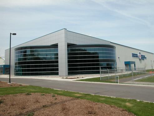 community building with curved glass wall
